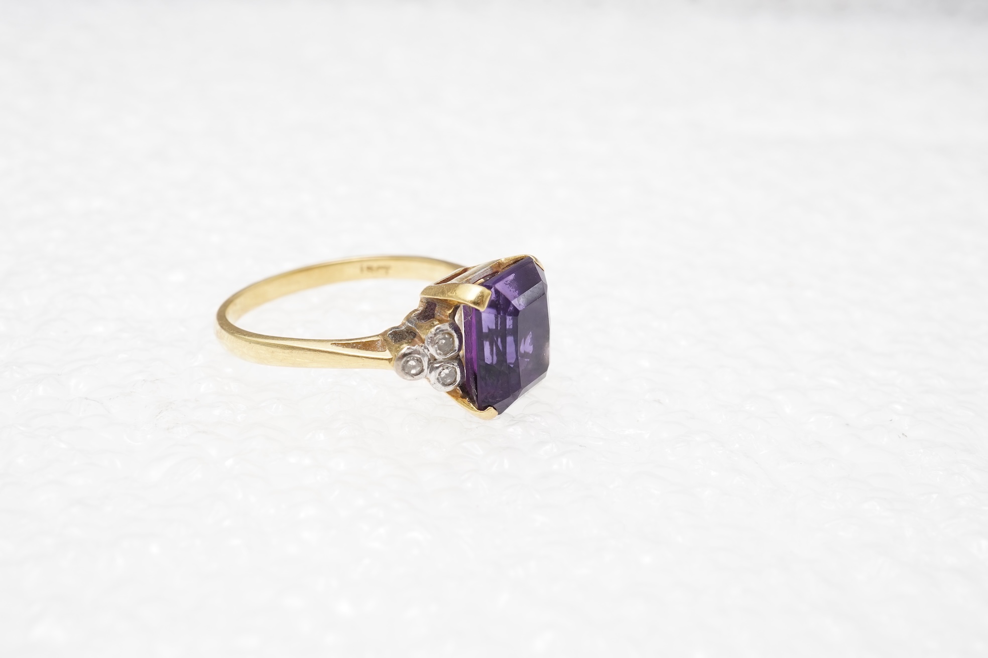 An amethyst and diamond ring